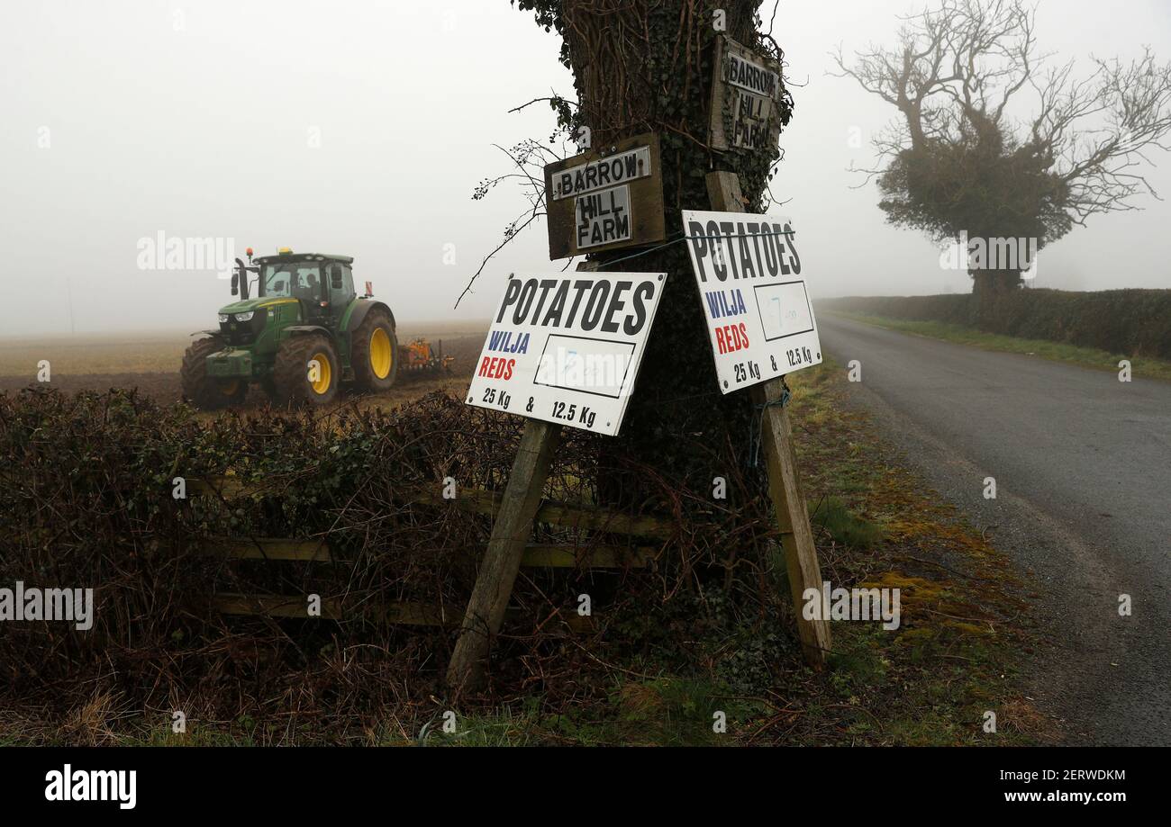 Peggs Green, Leicestershire, UK. 1st March 2021. UK weather. A farmer prepares a field in fog on the first day of the Meteorological spring. Credit Darren Staples/Alamy Live News. Stock Photo