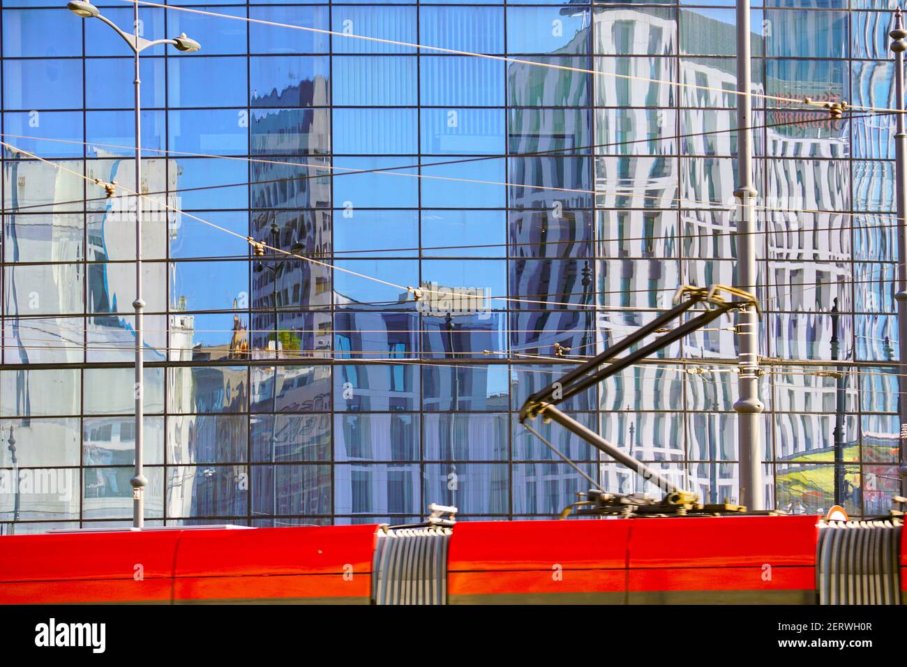 The facade of a modern building. Reflection in the facade of another building. Stock Photo