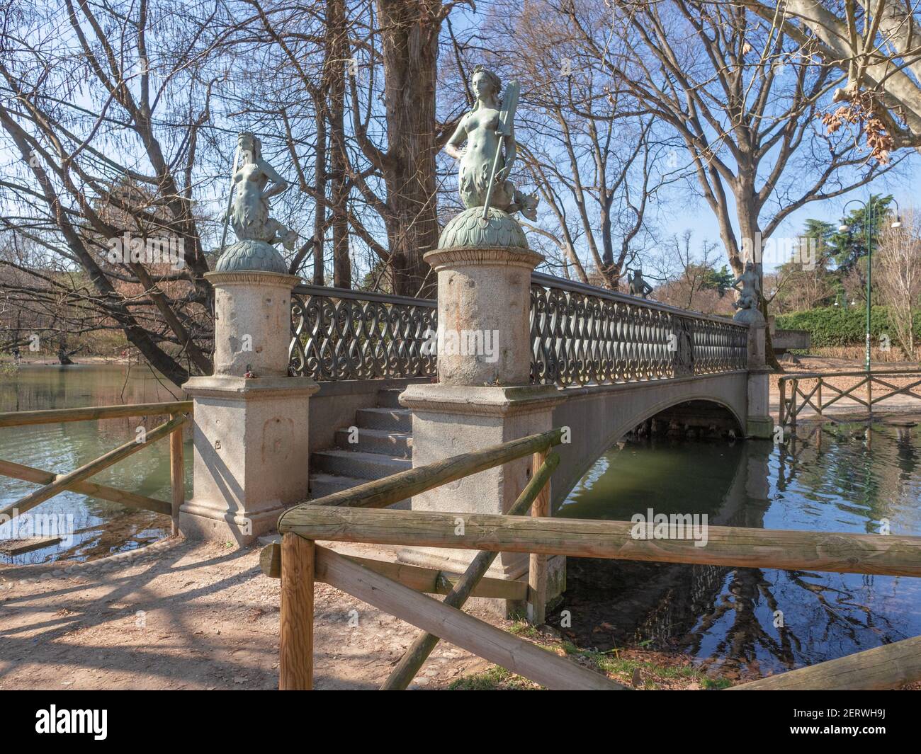 Ponte delle Sirenette,Mermaids Bridge, is a cast iron pedestrian bridge dating back to 1842 and relocated in the Sempione park after the canals were b Stock Photo