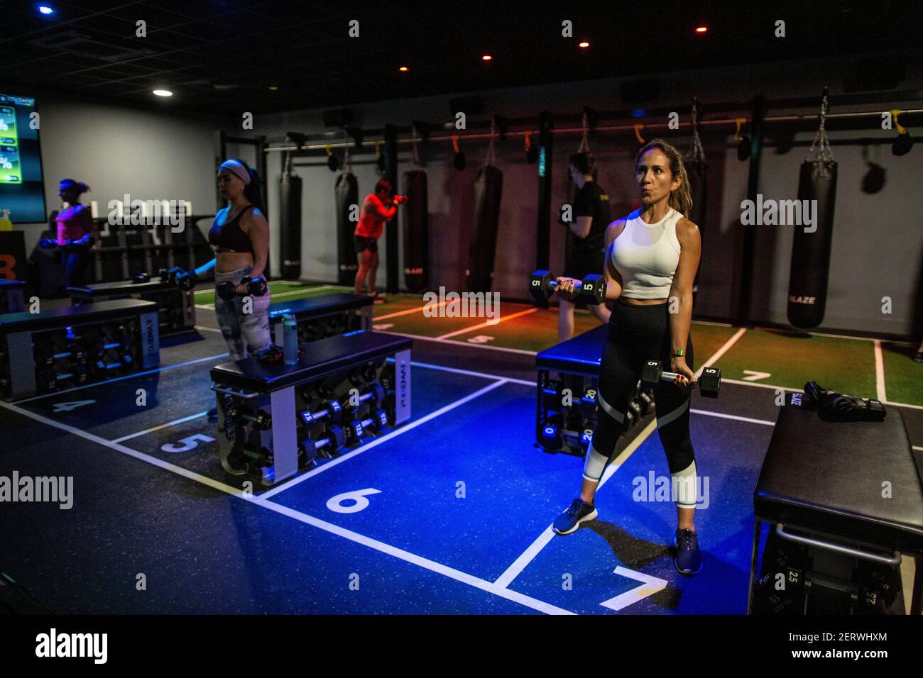 Members workout in one of the studio classes held at David Lloyd Hampton  club as it re-opens at midnight for the first time since lockdown#1 closure  Stock Photo - Alamy
