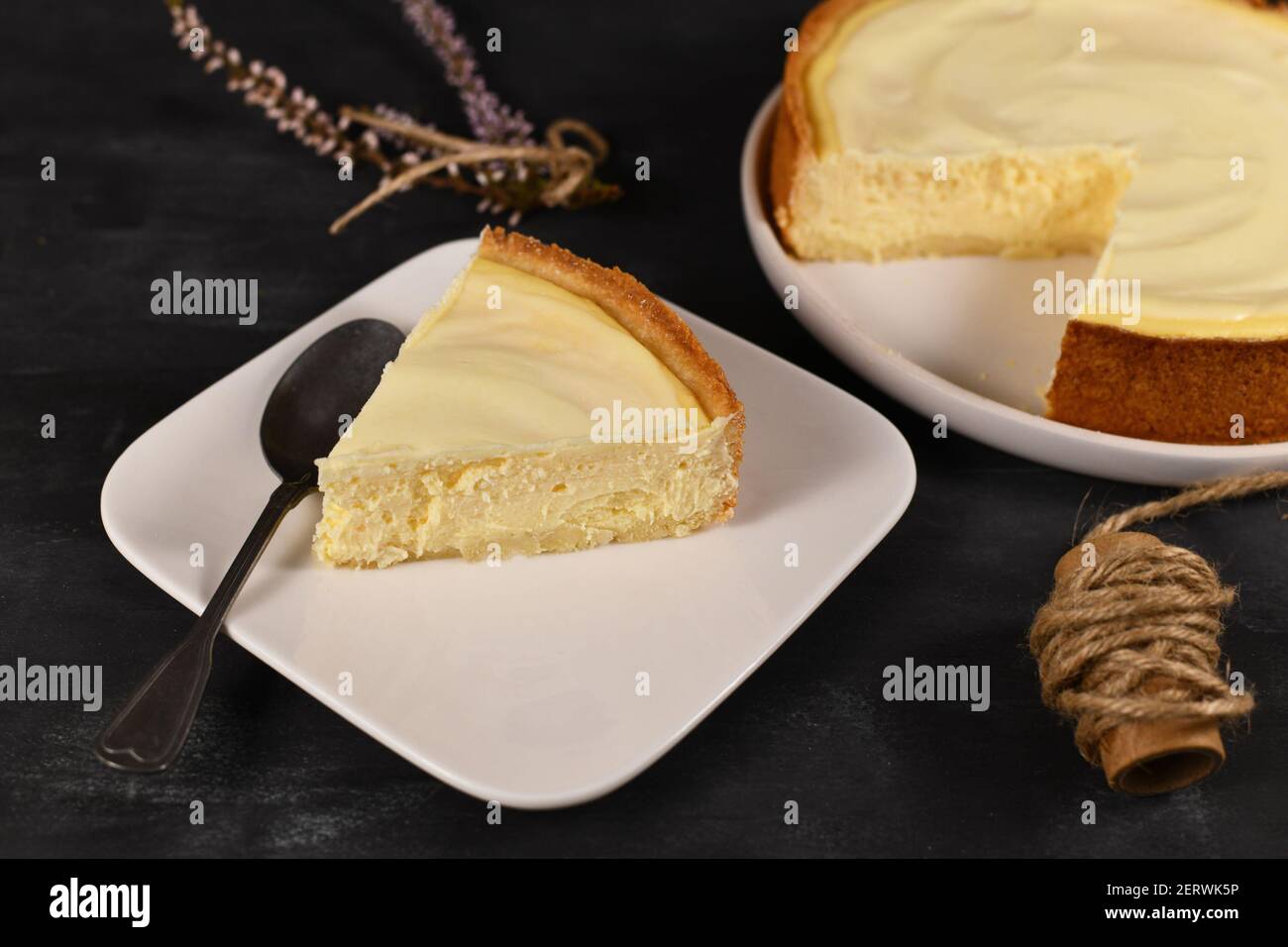 Slice of traditional New York cheesecake with cream cheese and sour