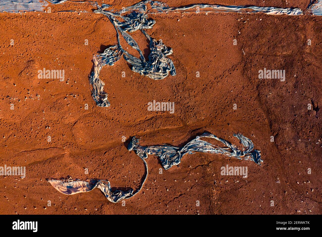 Aerial view of a reservoir full of red toxic sludge. Hungary red mud