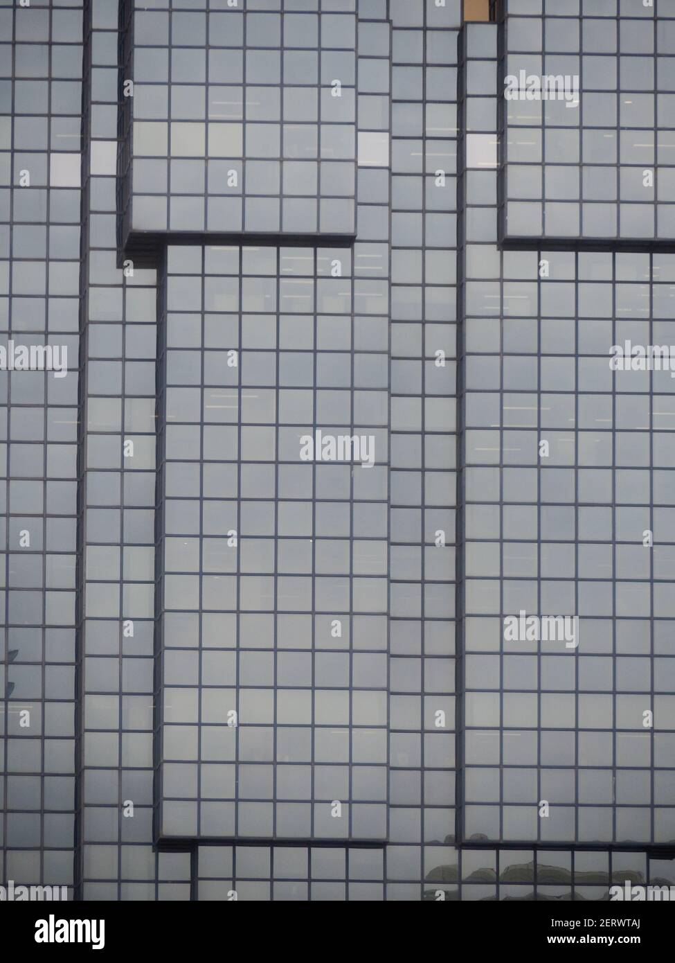 semi-abstract telephoto close-up of patterns of modern glass buildings Stock Photo