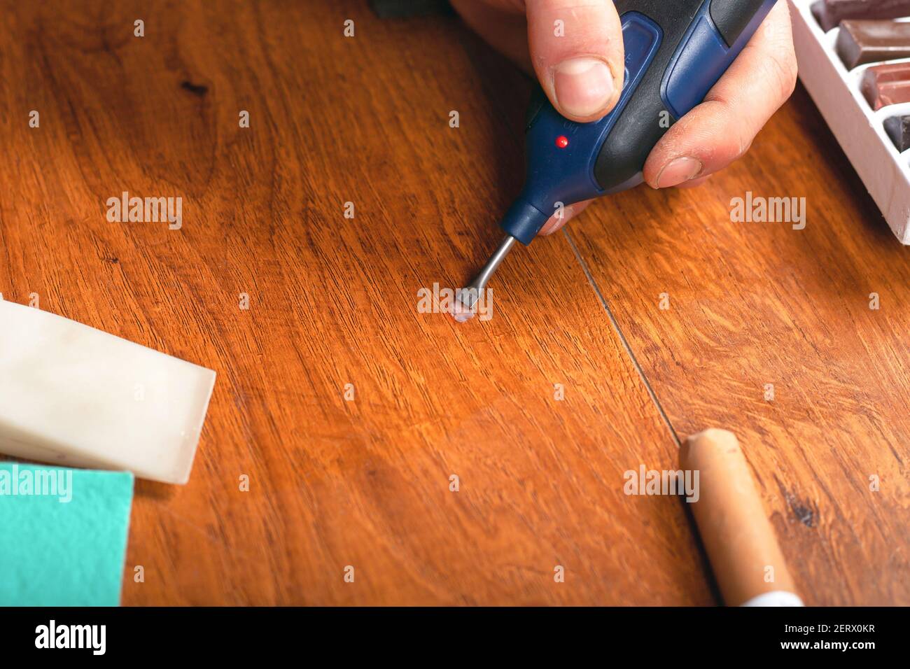 elimination of defects, chips, scratches in the laminate flooring