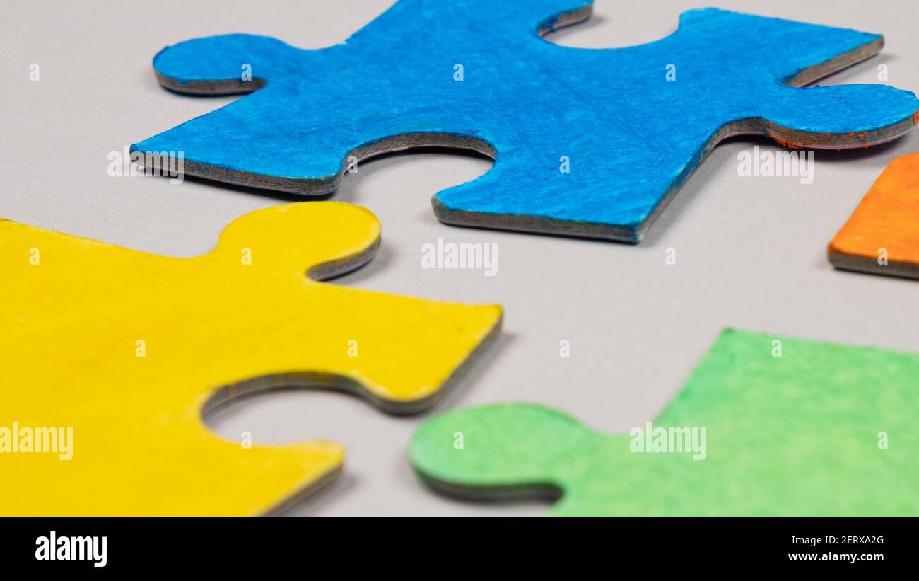 conceptual symbol of child autism,colorful puzzles closeup Stock Photo