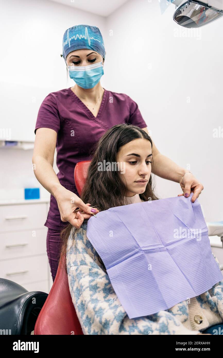 Female dentist wearing face mask hires stock photography and images