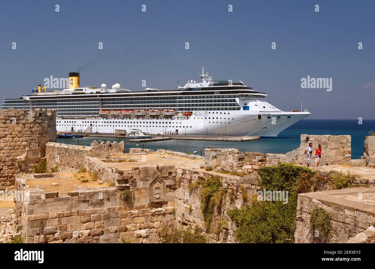 Cruise ship 'Costa Mediterranea' berthed at Kos City with Kos fortress foreground ,  Kos, Dodecanese Island group, Greece. Stock Photo