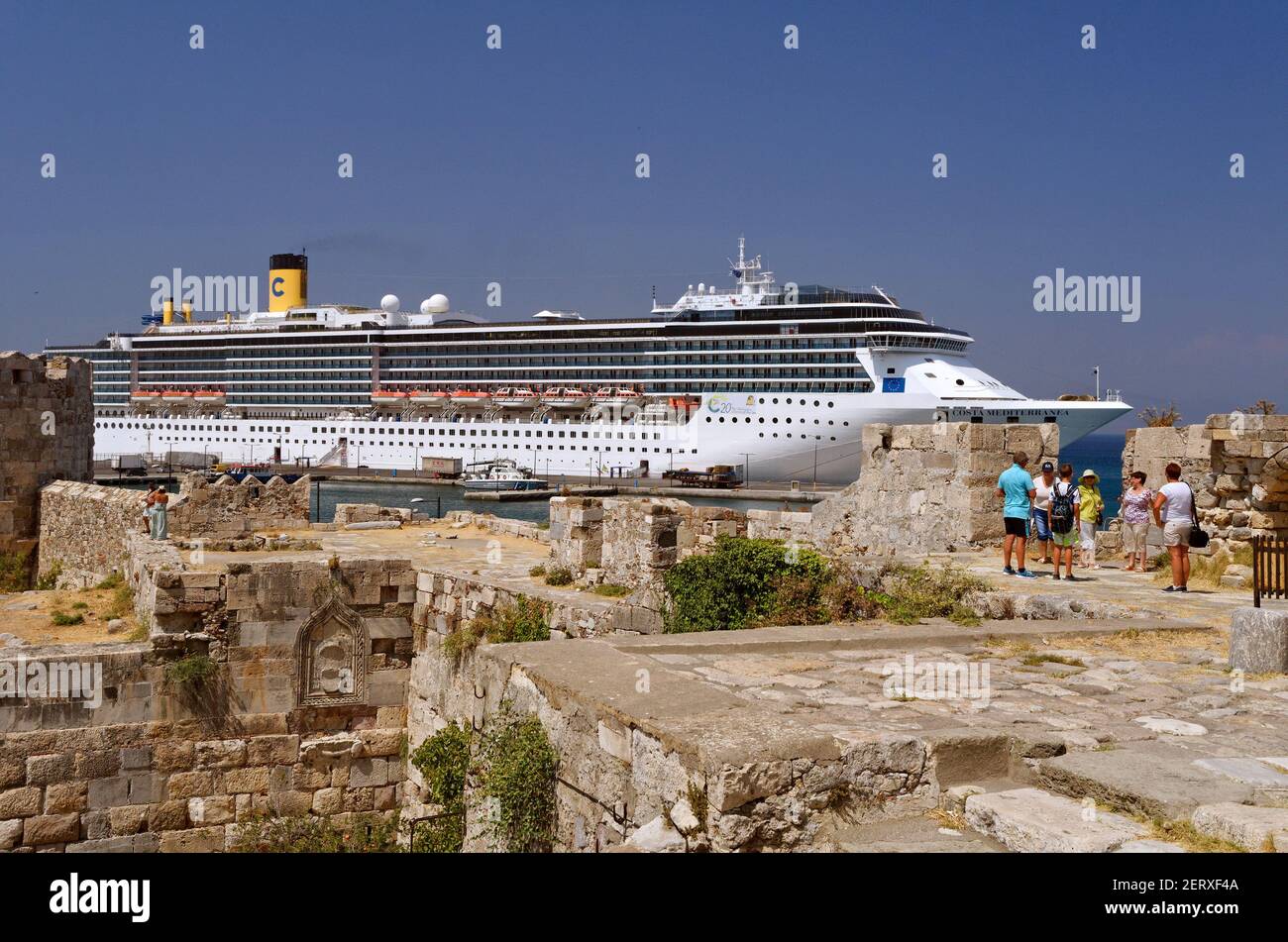 Cruise ship 'Costa Mediterranea' berthed at Kos City with Kos fortress foreground ,  Kos, Dodecanese Island group, Greece. Stock Photo
