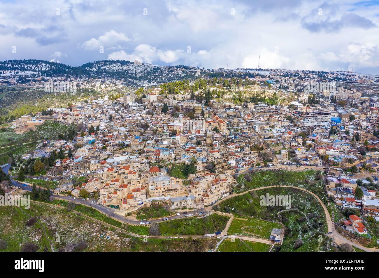 Safed old Jewish quarter houses, with light snow covering rooftops, Aerial view. Stock Photo