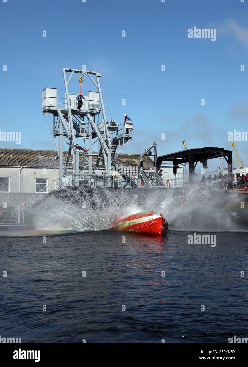 Sequence of a Free Fall Lifeboat being released and dropped Stock Photo