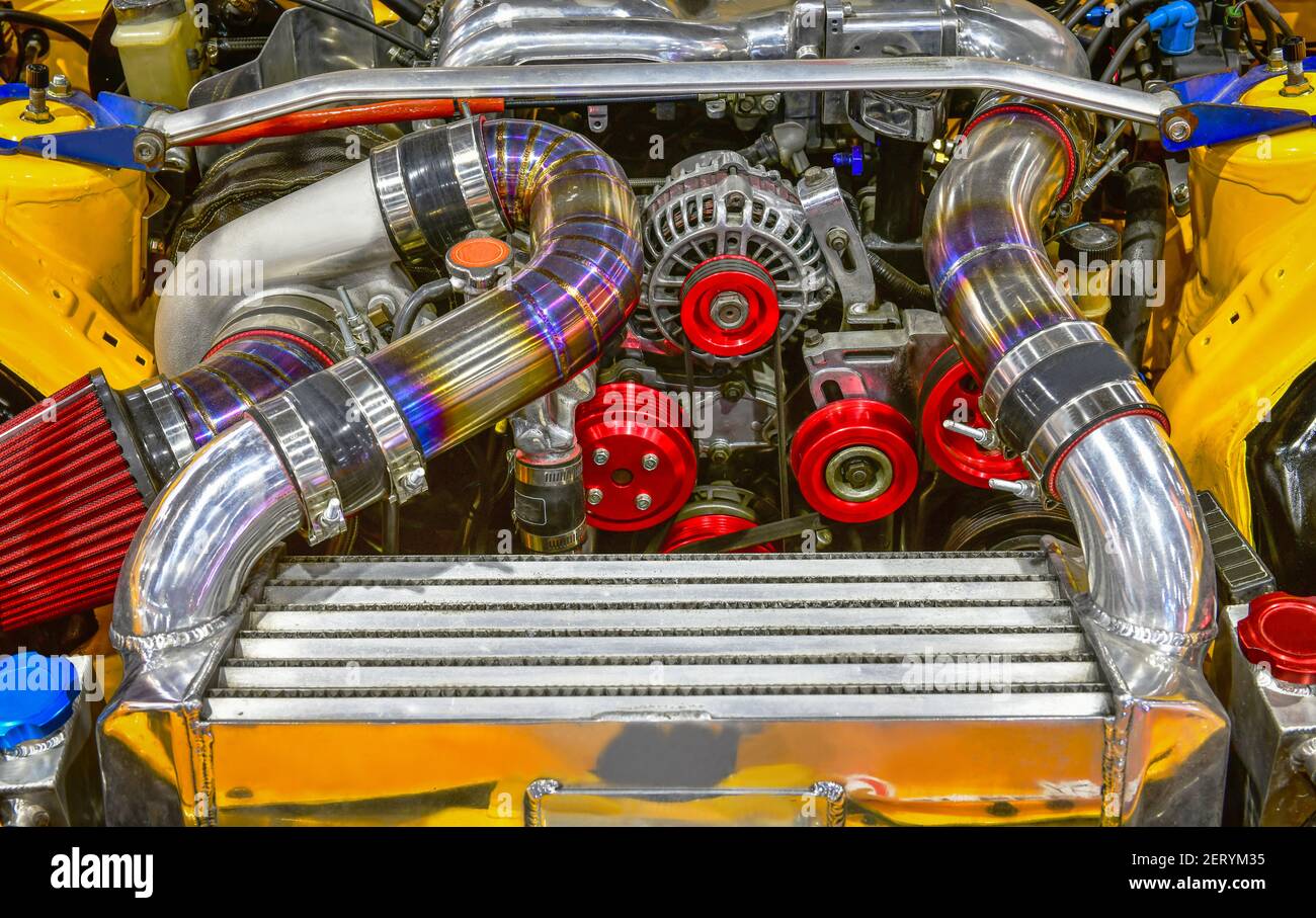 Close up colorful details of car engine. Modification of the turbo