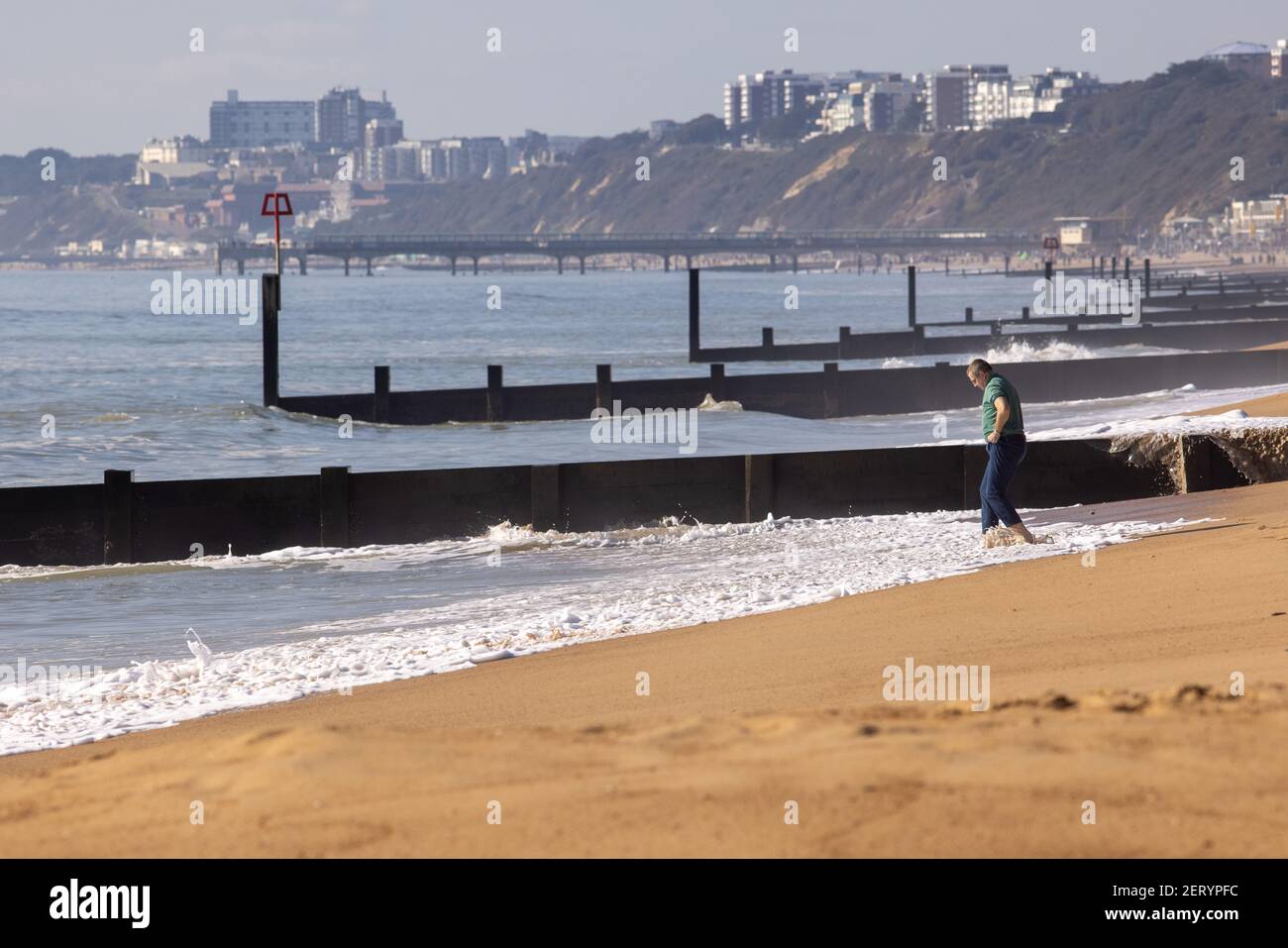 on the beach at Fisherman’s Walk, Southbourne, Bournemouth on a beautifully sunny February day during the COVID-19 coronavirus pandemic lockdown.. 27 Stock Photo