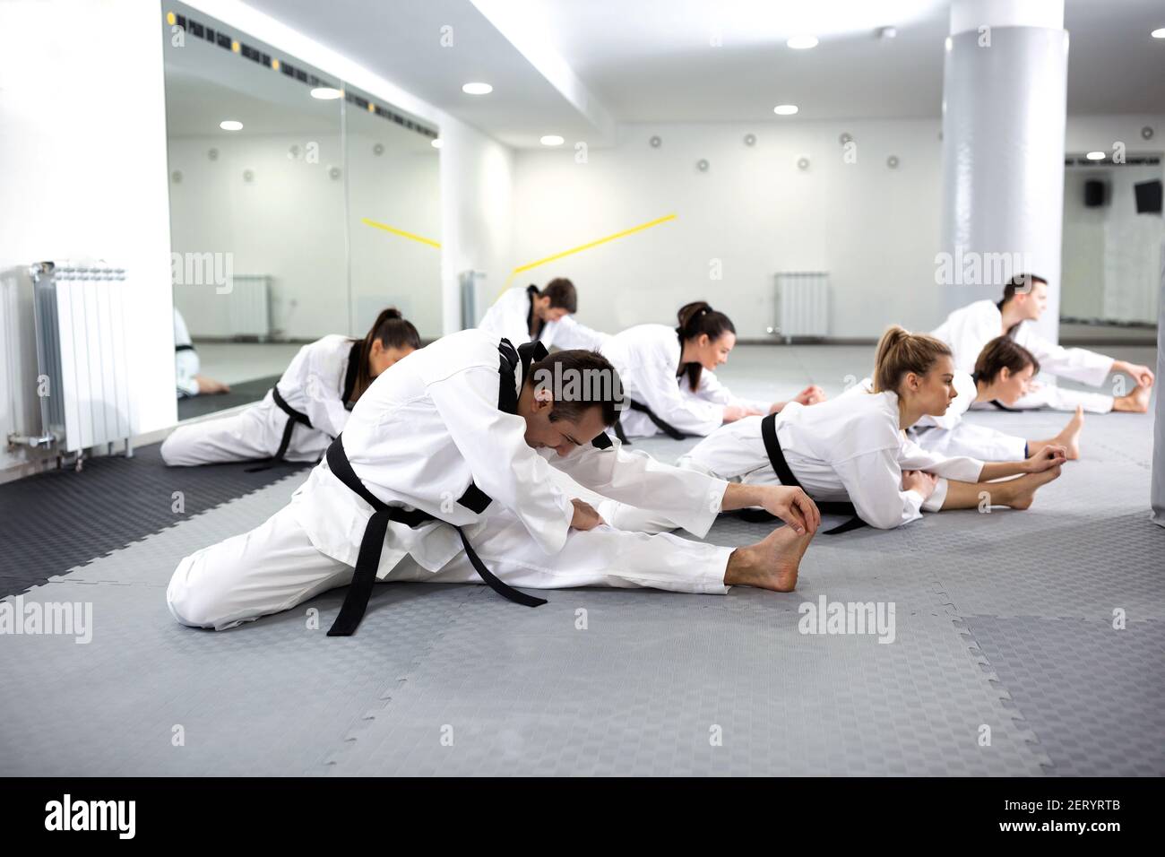 Martial arts combat fighters showing high discipline, dedication and physical shape Stock Photo