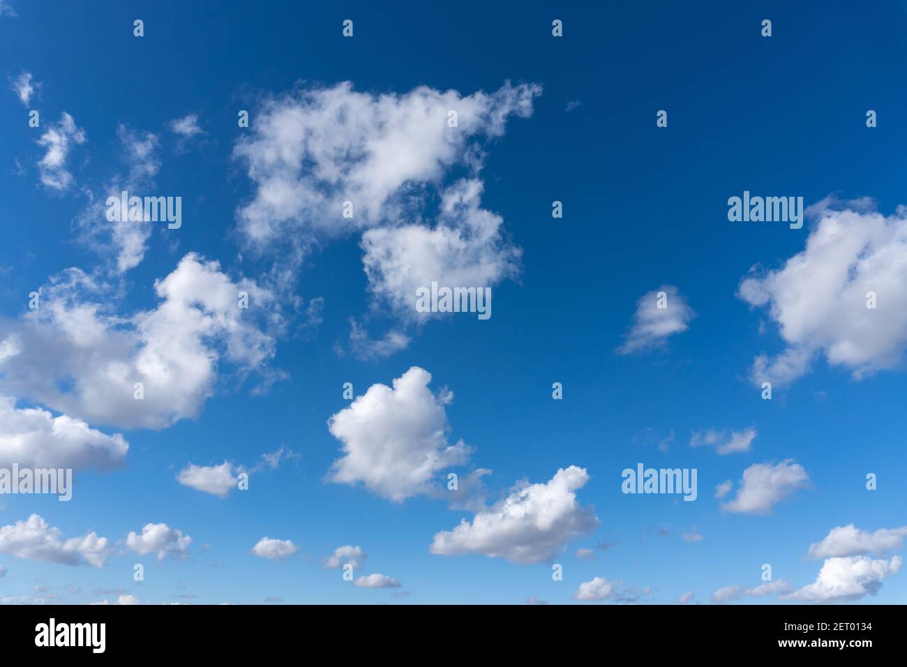 Stock photo of blue sky with some clouds Stock Photo - Alamy