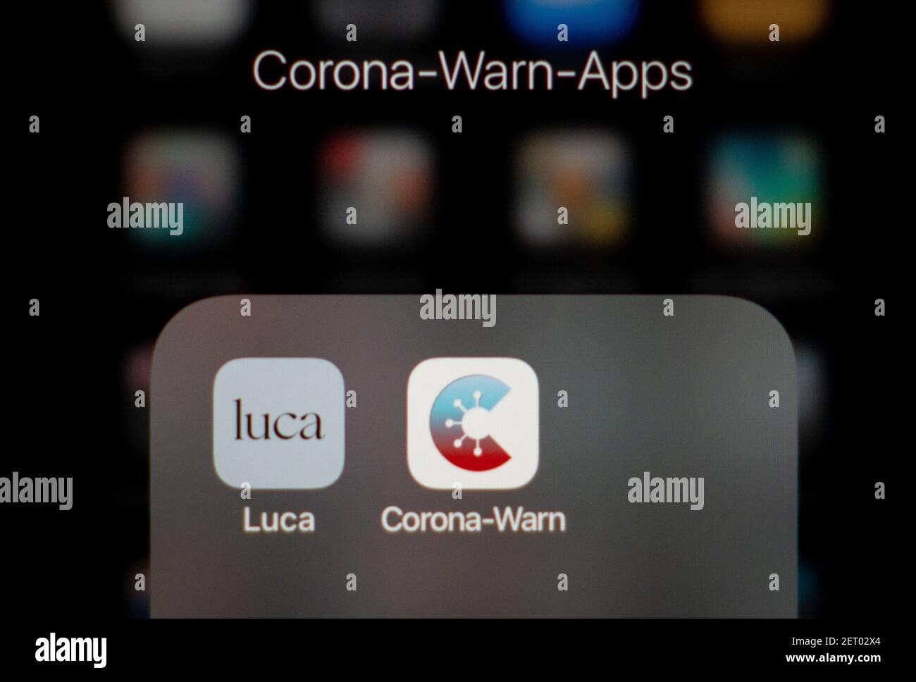 Berlin, Germany. 01st Mar, 2021. Illustration - The photo shows the icons of the Corona warning apps Luca and the Corona warning app of the Federal Government, represented by the Robert Koch Institute. The Corona warning app Luca is considered in various regions of Germany as part of an opening strategy of trade, culture and sports, because this allows a quick tracking of infection chains. Credit: Kay Nietfeld/dpa/Alamy Live News Stock Photo