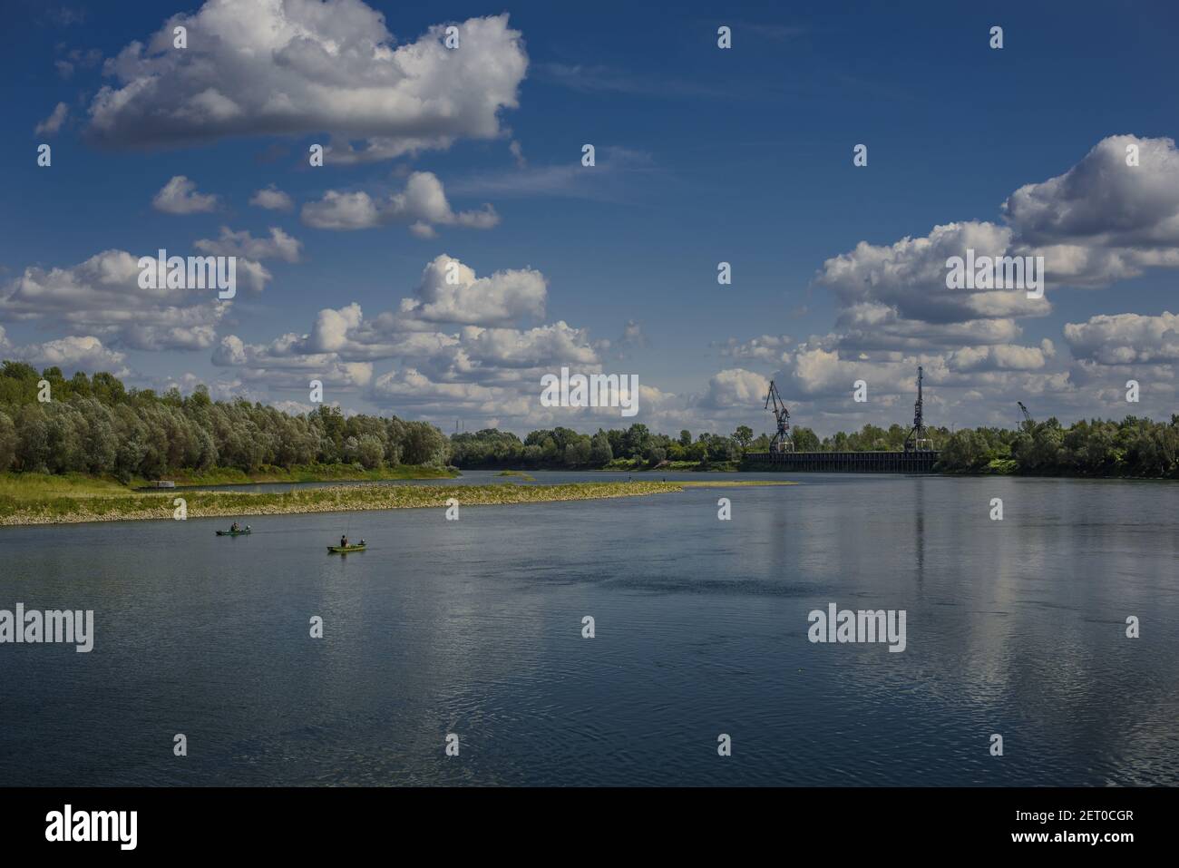 A blue lake under cloudy sky Stock Photo - Alamy