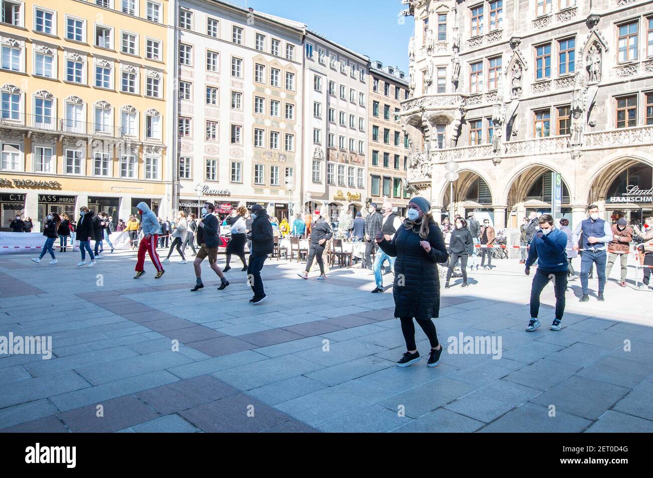 Munich, Bavaria, Germany. 1st Mar, 2021. Ahead of the German Bund-Laender Gespraech (Federation and State Conference) on March 3rd, associations of Hoteliers and the Gastronomy branches organized the Marienplatz silent protest with music and dancing with prepared tables and beds to represent the threats to the existence of these industries. The groups, including Dehoga, are not demanding a reopening at any price, but rather requesting a reliable exit plan for which they may plan. Credit: Sachelle Babbar/ZUMA Wire/Alamy Live News Stock Photo