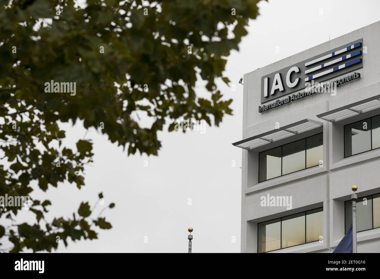 A logo sign outside of a facility occupied by International Automotive Components Group (IAC) in A logo sign outside of a facility occupied by International Automotive Components Group (IAC) in
