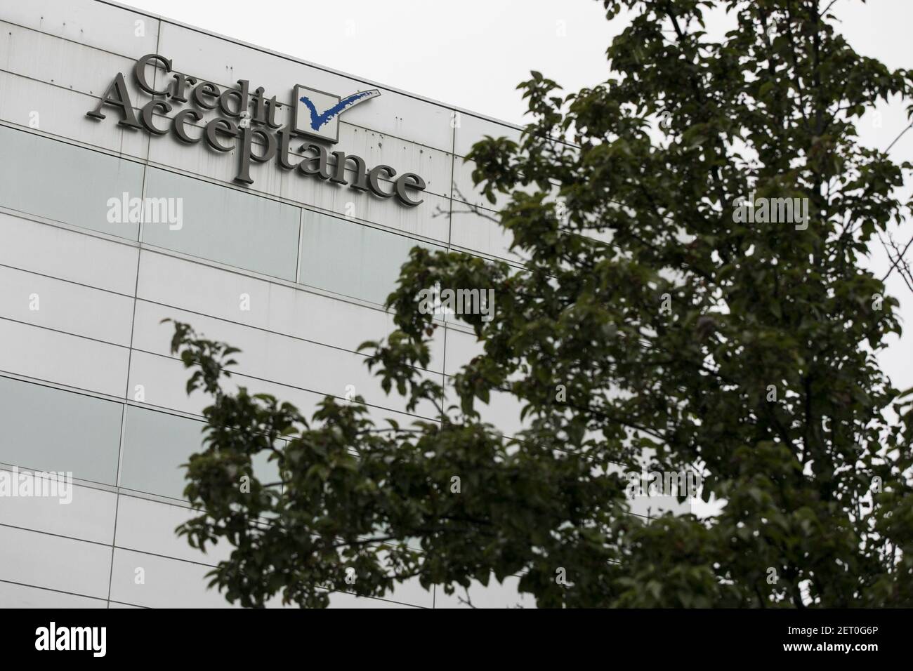 A logo sign outside of the headquarters of the Credit Acceptance