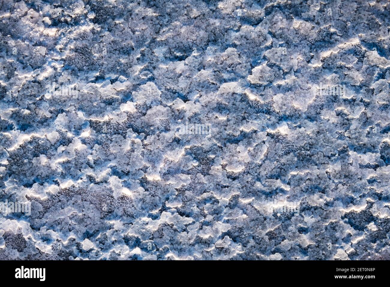 Salt crystals texture near pink water salt lake in Ukraine, Europe Stock Photo
