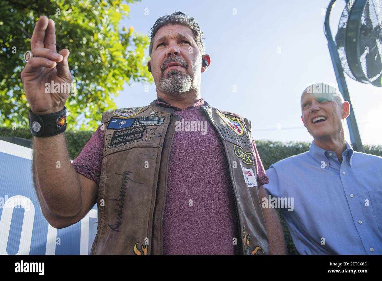 UNITED STATES - NOVEMBER 4: Chris Cox, founder of Bikers for Trump, and Florida Gov. Rick Scott (R), who is running for the U.S. Senate, attend a rally hosted by the group at the 27 Bar & Lounge in Fort Lauderdale on November 4, 2018. (Photo By Tom Williams/CQ Roll Call) Stock Photo