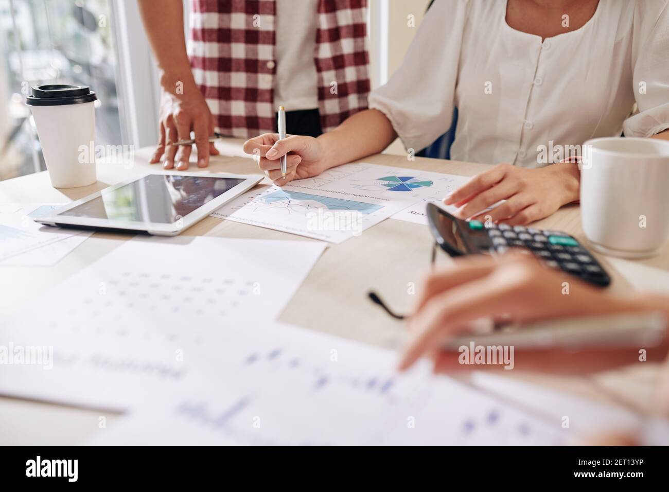Business people discussing reports Stock Photo