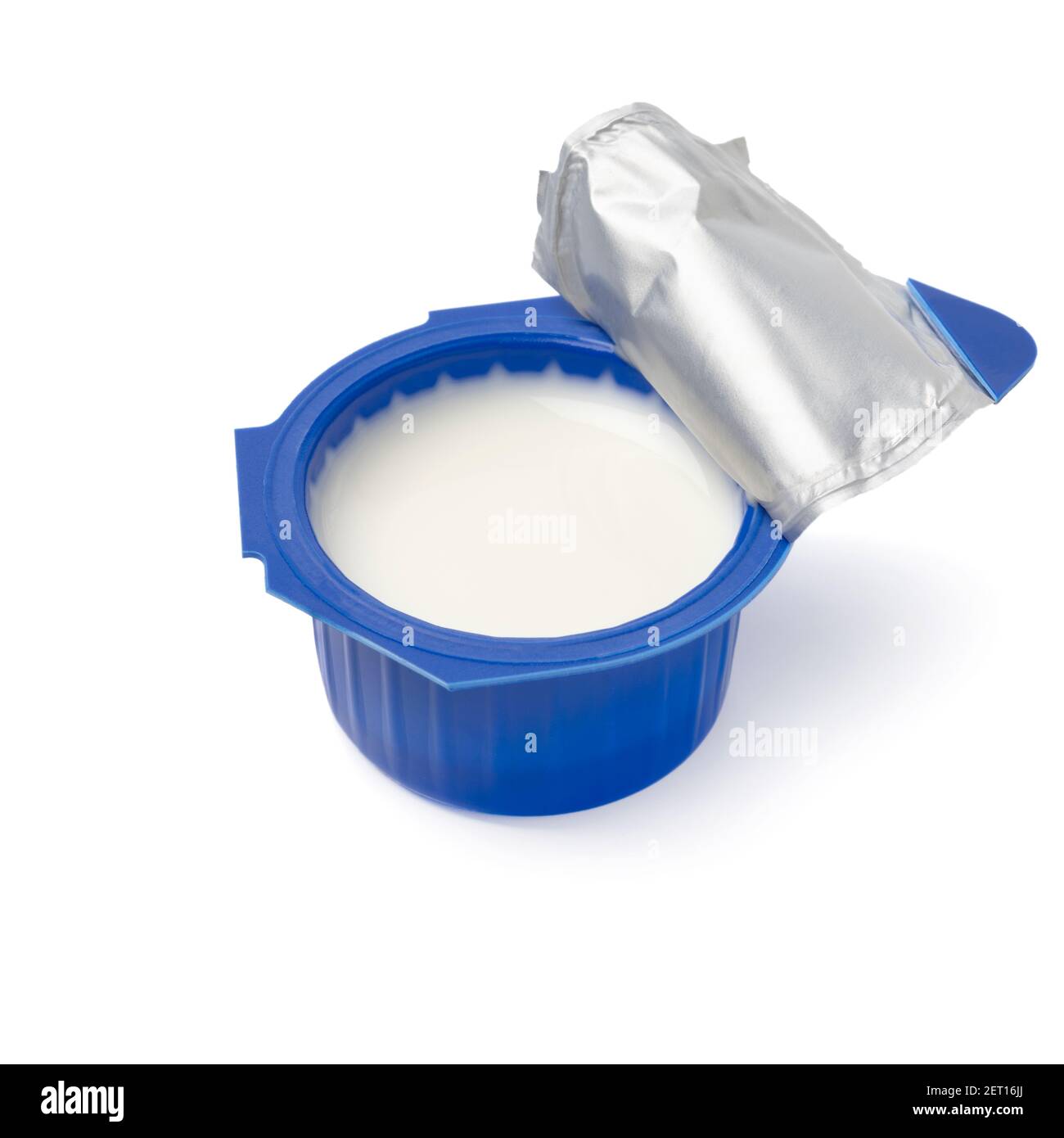 Single open blue plastic cup of coffee creamer close up isolated on white  background Stock Photo - Alamy