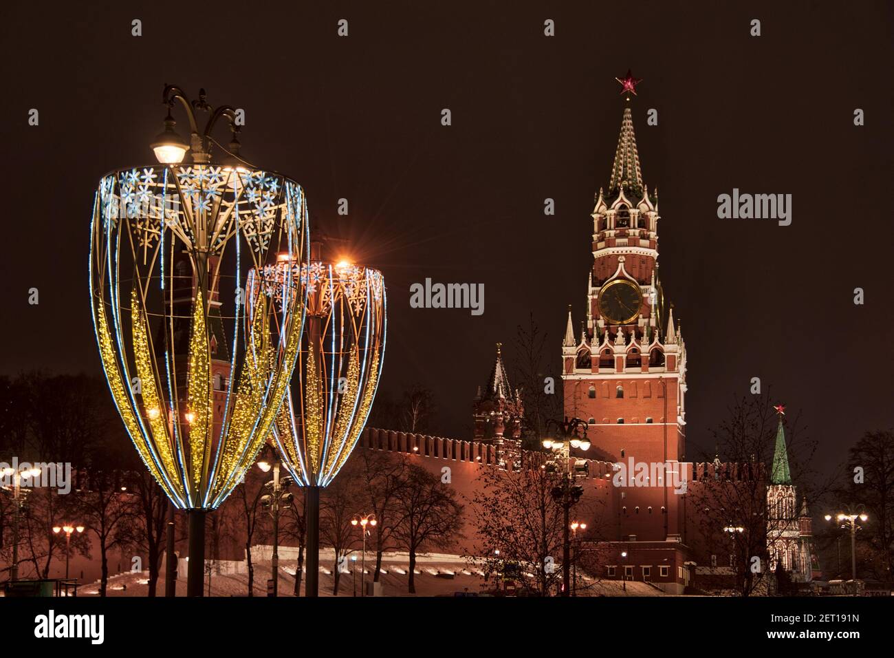Glass-Shaped Street Lights and Spasskaya Tower at Night Stock Photo