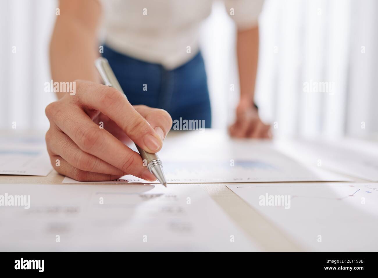 Businessman checking figures in reports Stock Photo