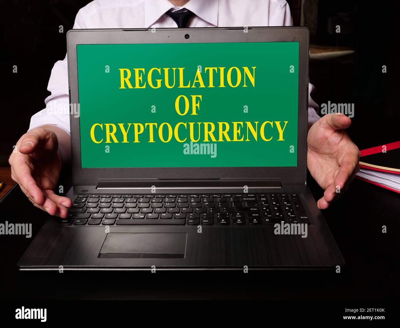 Regulation of Cryptocurrency law on the laptop. Stock Photo