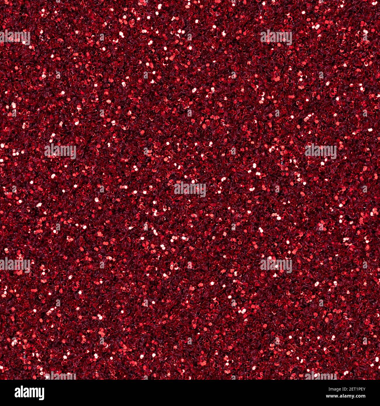 Deep red glitter, sparkle confetti texture. Christmas abstract