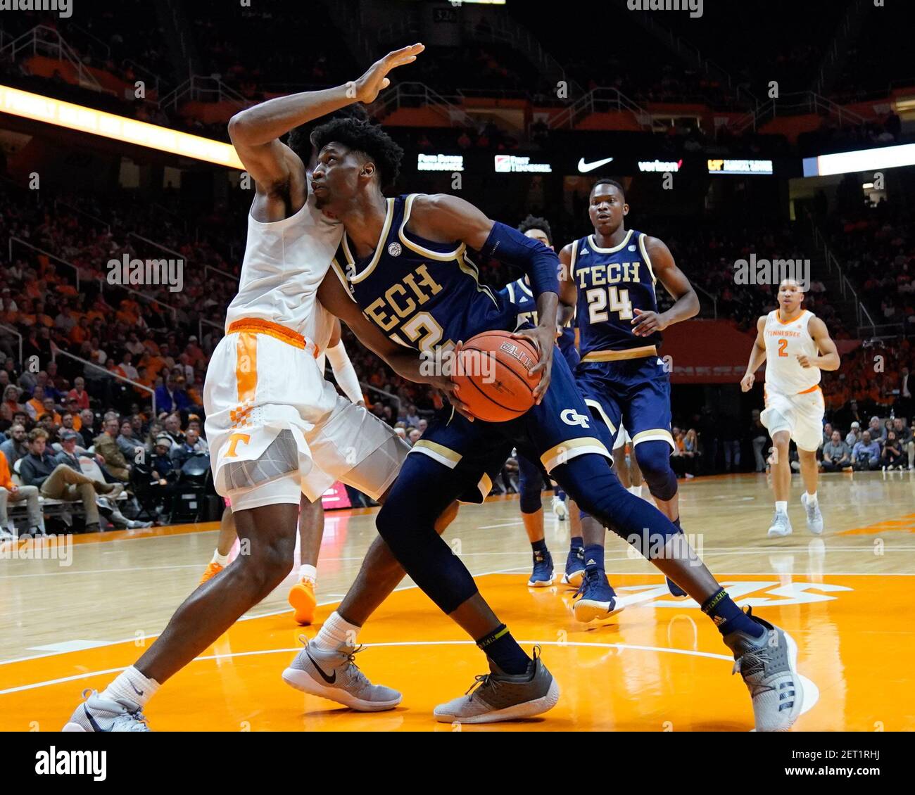 November 13, 2018: Khalid Moore #12 of the Georgia Tech Yellow Jackets  drives to the basket against Kyle Alexander #11 of the Tennessee Volunteers  during the NCAA basketball game between the University