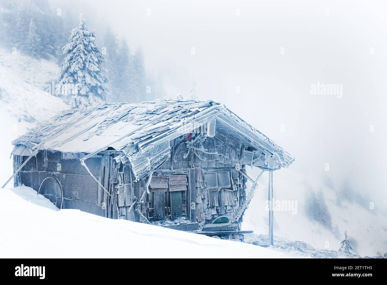 frozen cabin in the bavarian alps Stock Photo