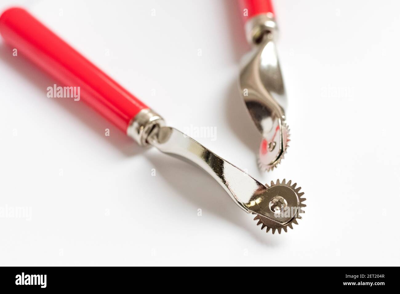 two leather sewing tools on a white background Stock Photo
