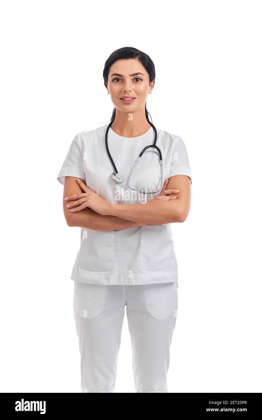 Charming female doctor in medical uniform with stethoscope on neck ...
