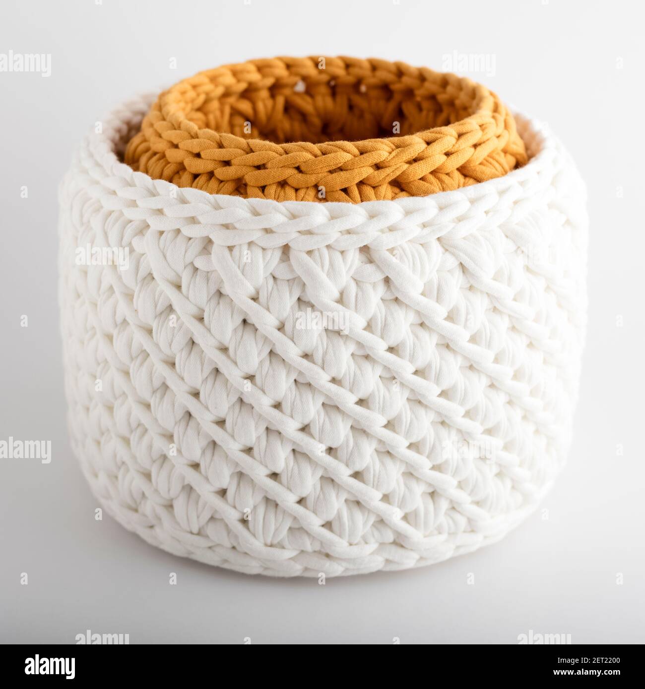 set of wicker baskets, handmade on a white background. texture of
