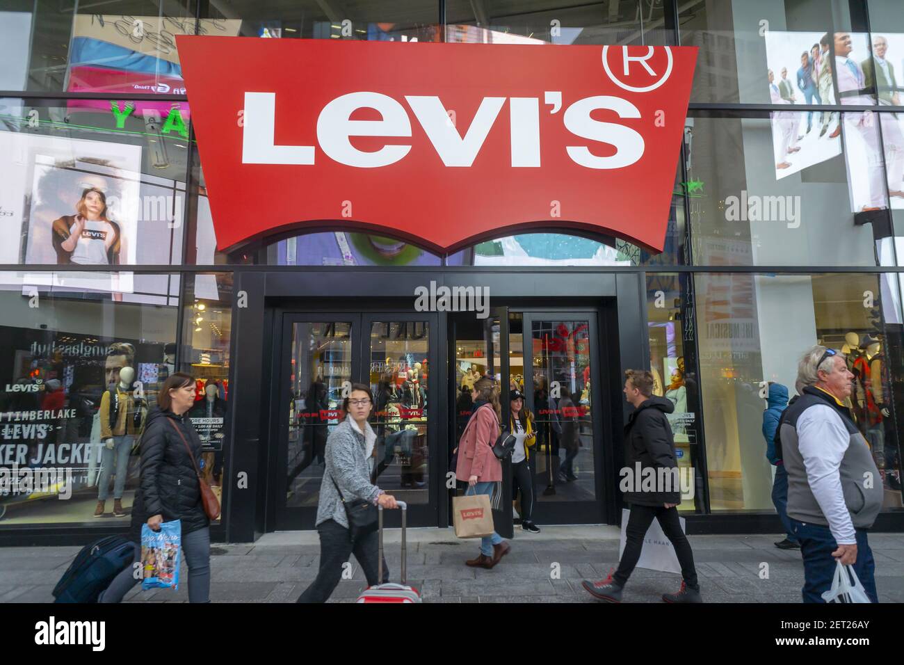 Signage of Levi's brand in New York City, USA glowing at night on an  advertisement board. Levi Strauss & Co. is a privately held American  clothing co Stock Photo - Alamy