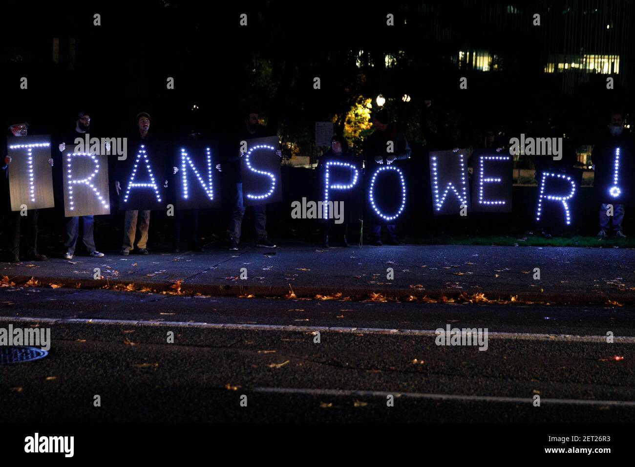 About one hundred people rallied under the theme 'We Won't Be Erased ...