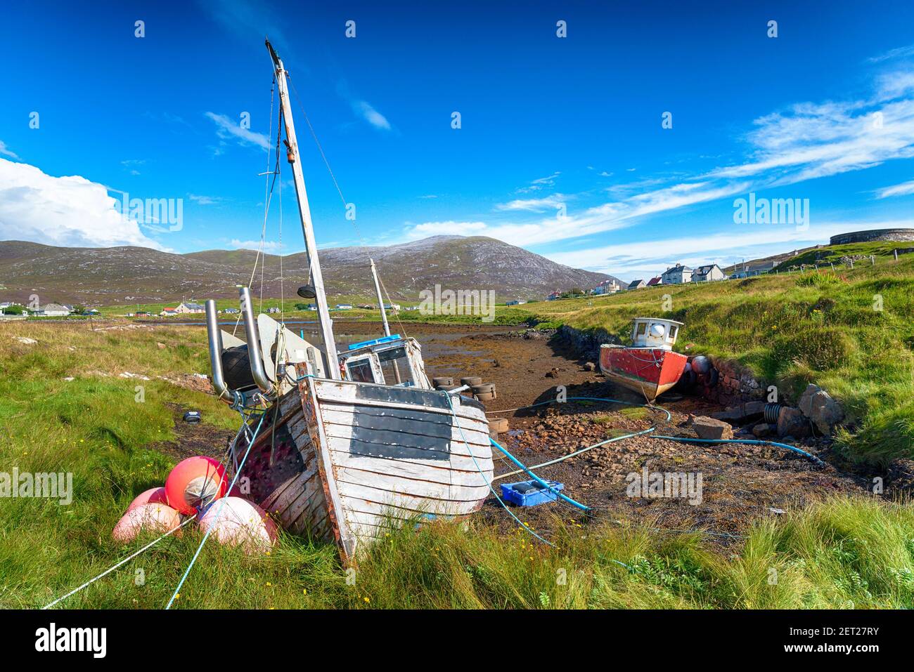 Old fishing boats at Leverburgh on the Isle of Harris in Scotland Stock Photo