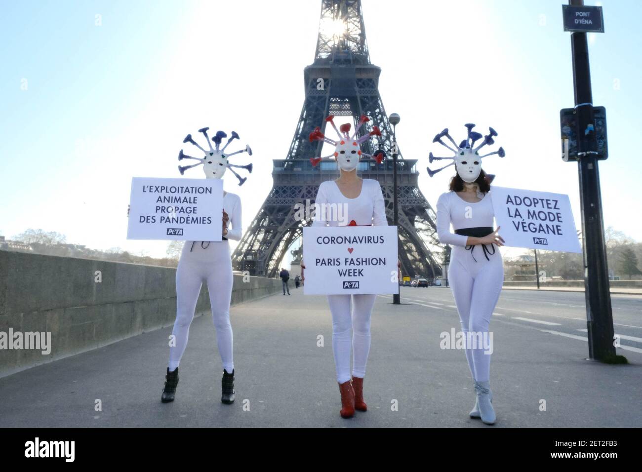 Animal rights activists wearing COVID-19 mask take part in a protest ...