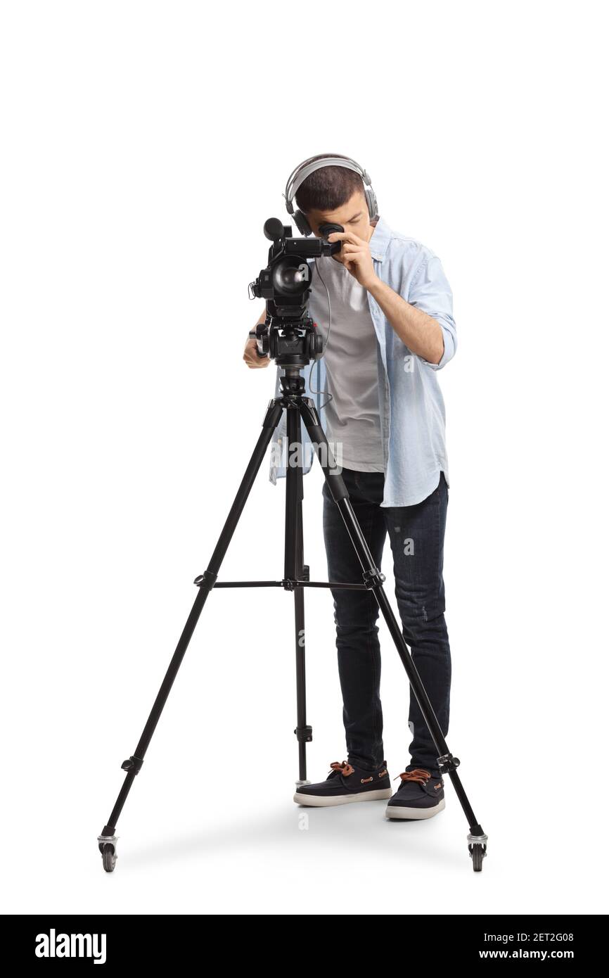 Young man recording with a camera on a tripod stand isolated on white