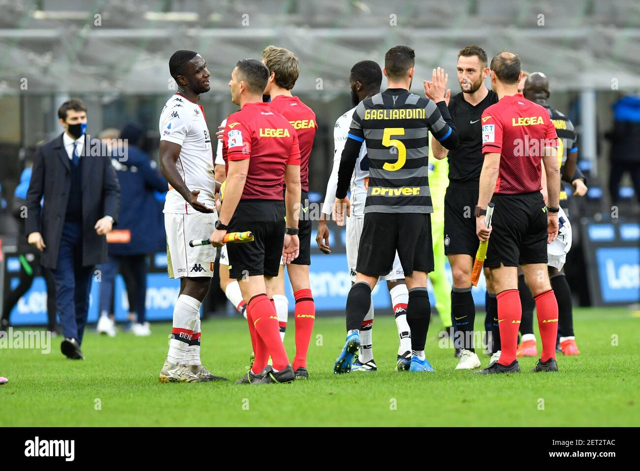 Milano, Italy. 28th, February 2021. Cristian Zapata (2) of Genoa seen with referee Daniele Chiffi after the Serie A match between Inter Milan and Genoa at Giuseppe Meazza in Milano. (Photo credit: Gonzales Photo - Tommaso Fimiano). Stock Photo