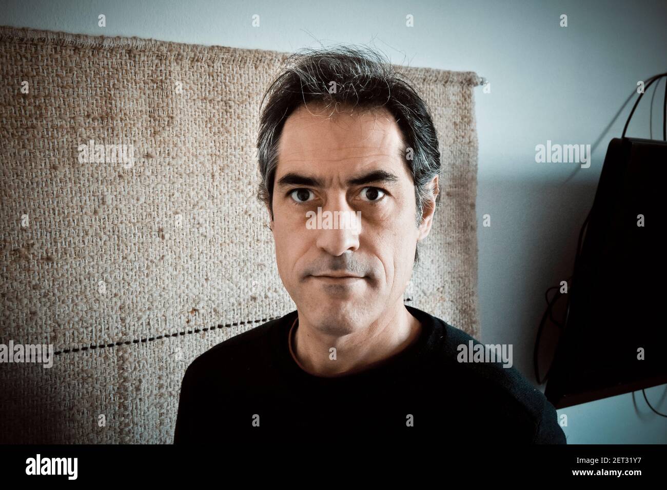 Portrait of a middle-aged man at home. Stock Photo