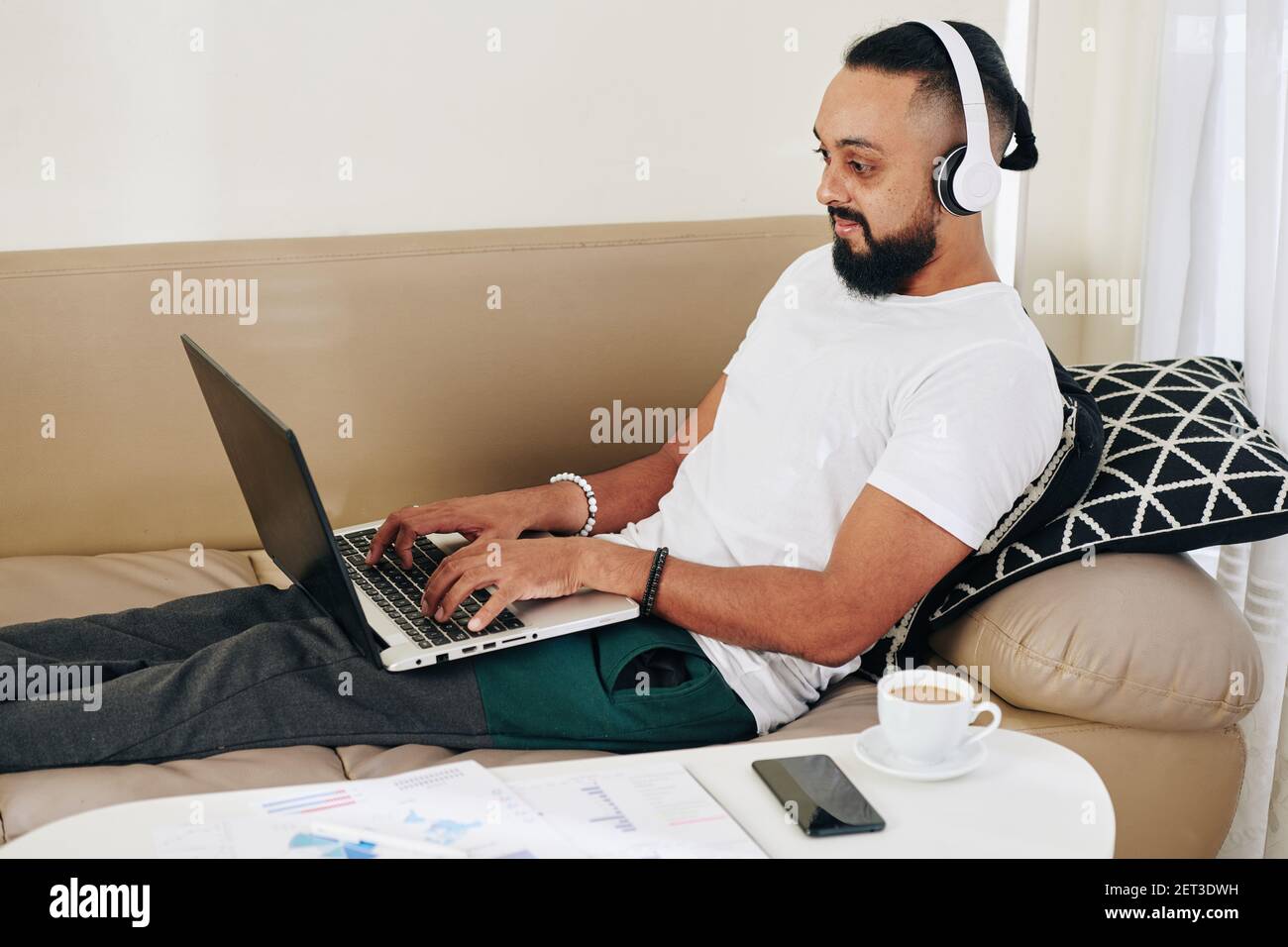 Man working on laptop Stock Photo