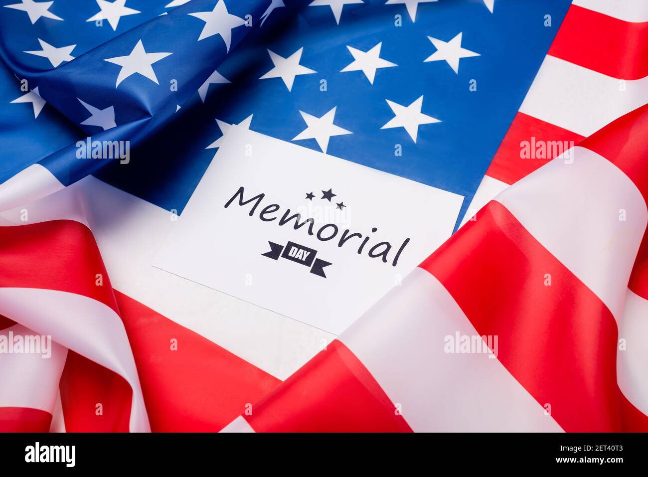 Card with memorial day lettering on american flag Stock Photo - Alamy
