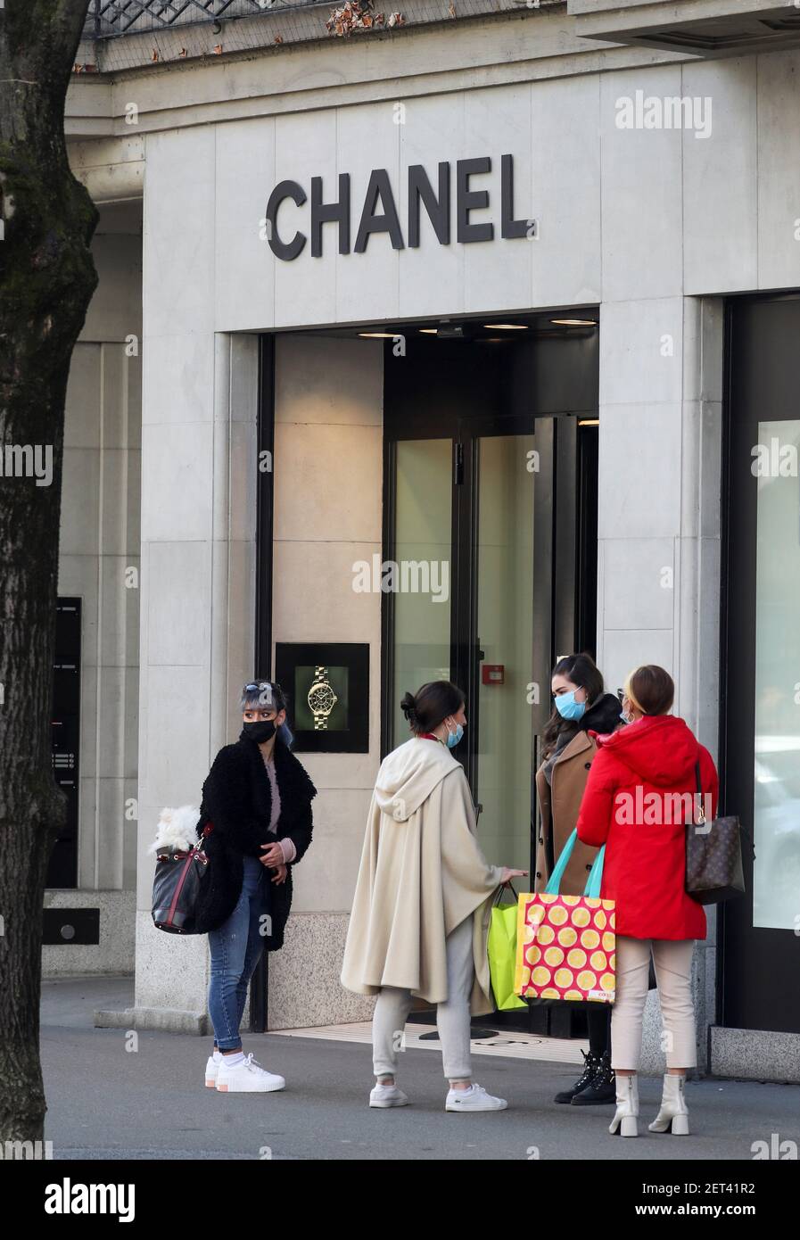 Shoppers queue in front of a re-opened store of the French fashion house  Chanel after the Swiss government relaxed some of its COVID-19  restrictions, as the spread of the coronavirus disease continues,