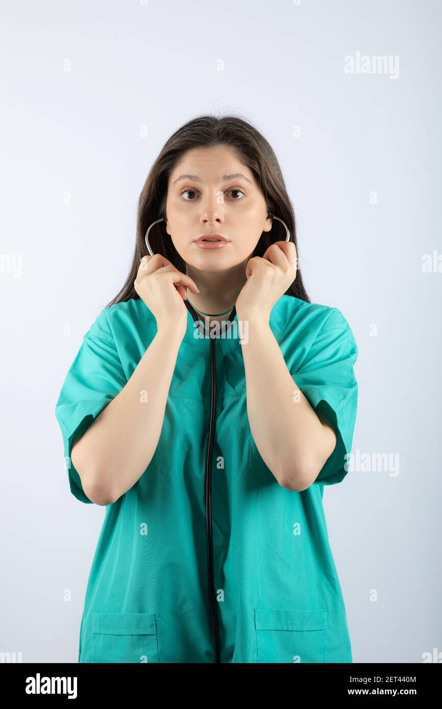 Portrait of a young woman doctor with stethoscope in uniform Stock ...
