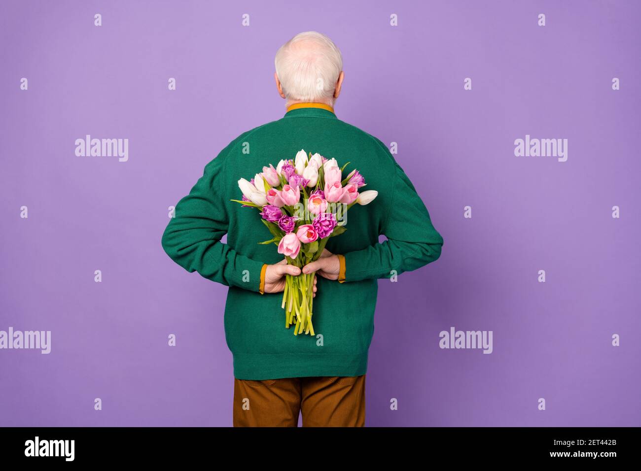 Old man hands behind back hi-res stock photography and images - Alamy