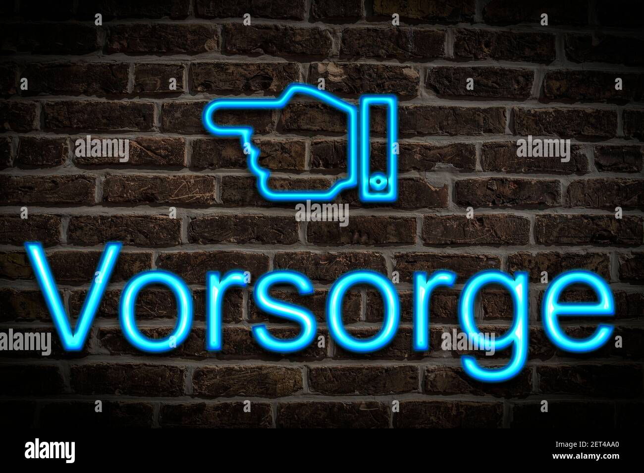 Detail photo of a neon sign on a wall with the inscription Vorsorge (Prevention) Stock Photo