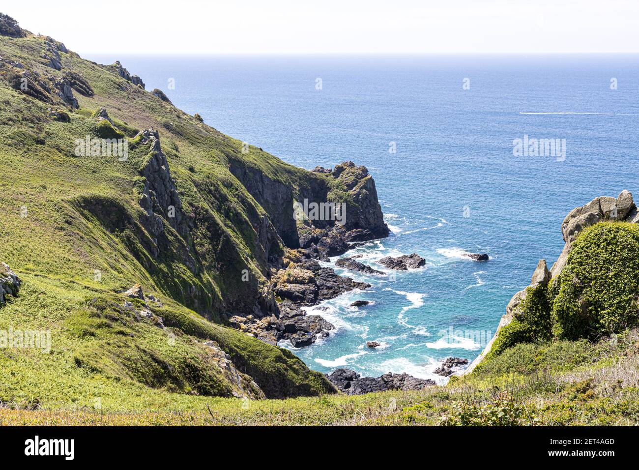 The beautiful rugged south coast of Guernsey, Channel Islands UK - La Bette Bay viewed from near Icart Stock Photo